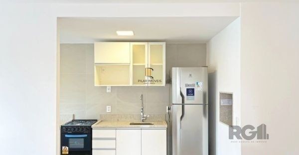 Apartamento no bairro Auxiliadora de 2 dormitórios vaga e infra