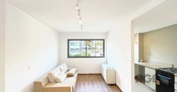 Apartamento no bairro Auxiliadora de 2 dormitórios vaga e infra