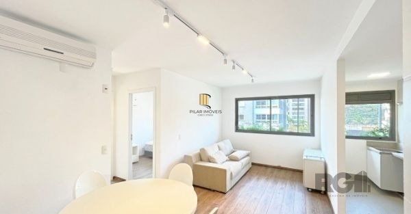 Apartamento no bairro Auxiliadora de 2 dormitórios vaga e infra