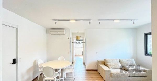 Apartamento no bairro Auxiliadora de 2 dormitórios vaga e infra