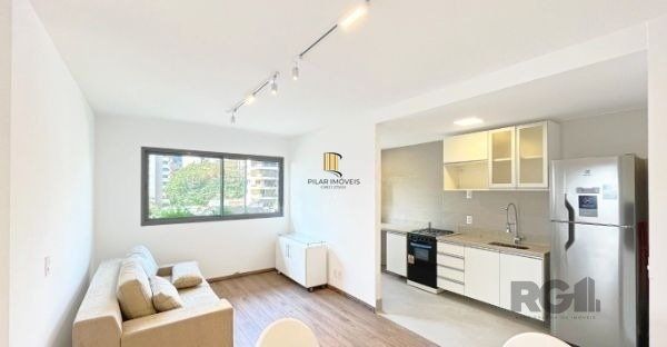 Apartamento no bairro Auxiliadora de 2 dormitórios vaga e infra