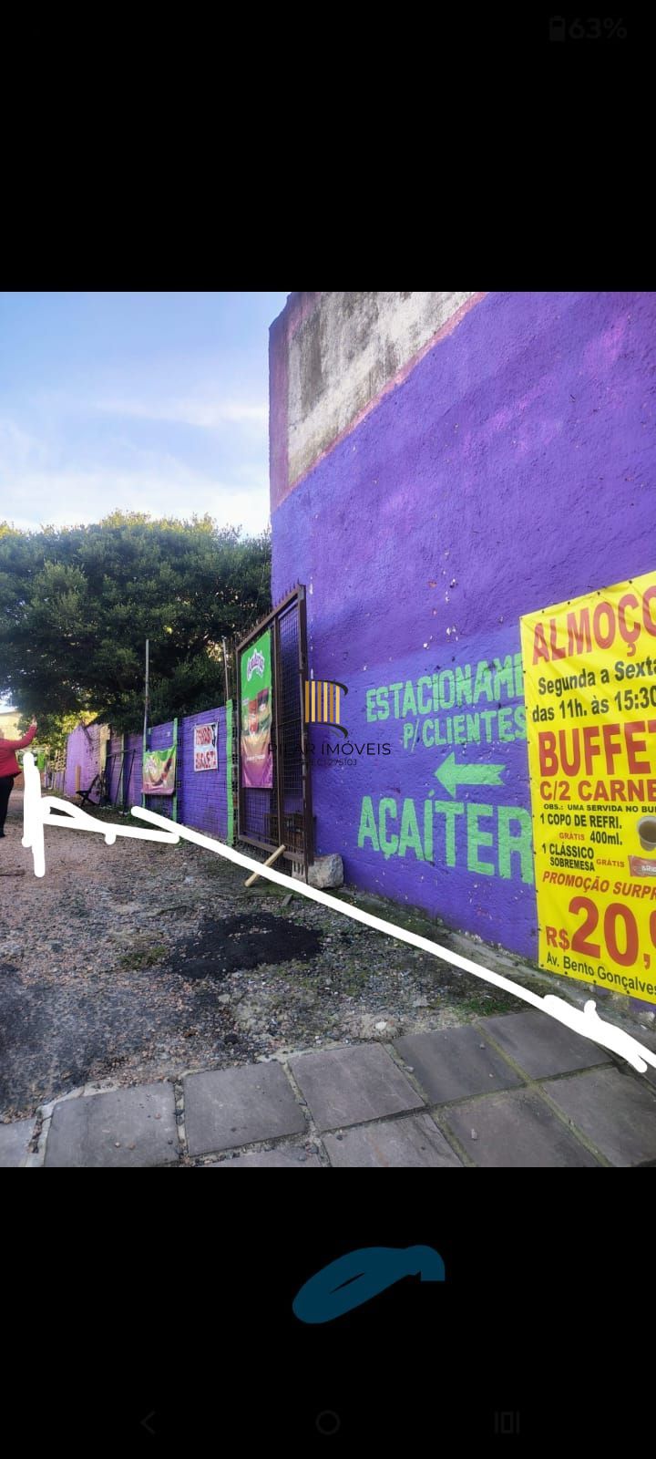 Terreno no Partenon com sobrado de alvenaria