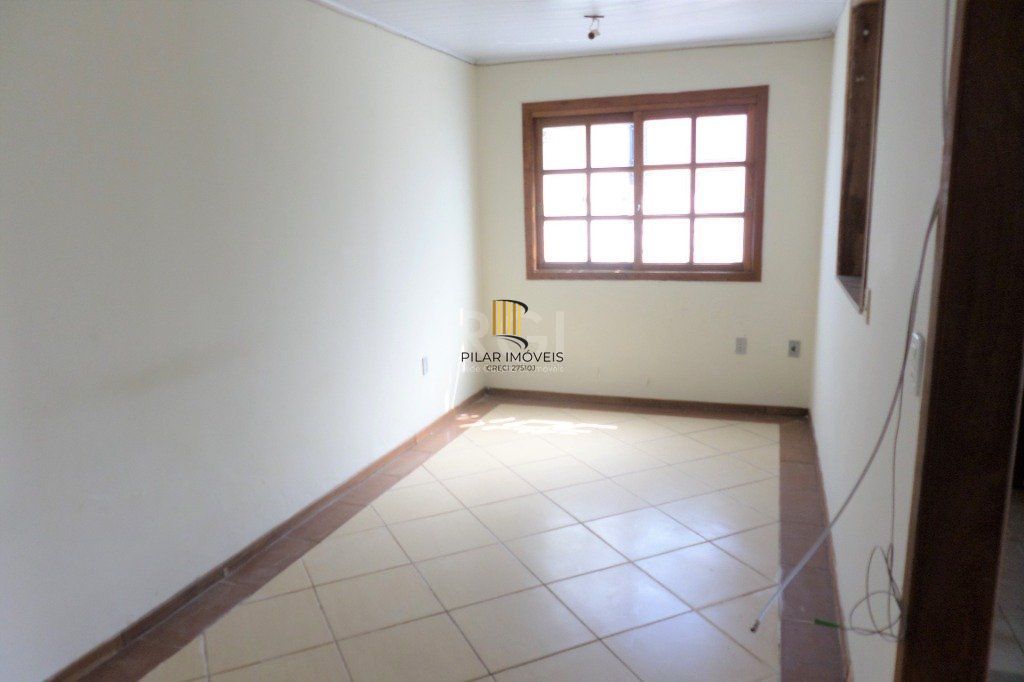 Casa na Hípica com 3 dormitórios e 2 vagas