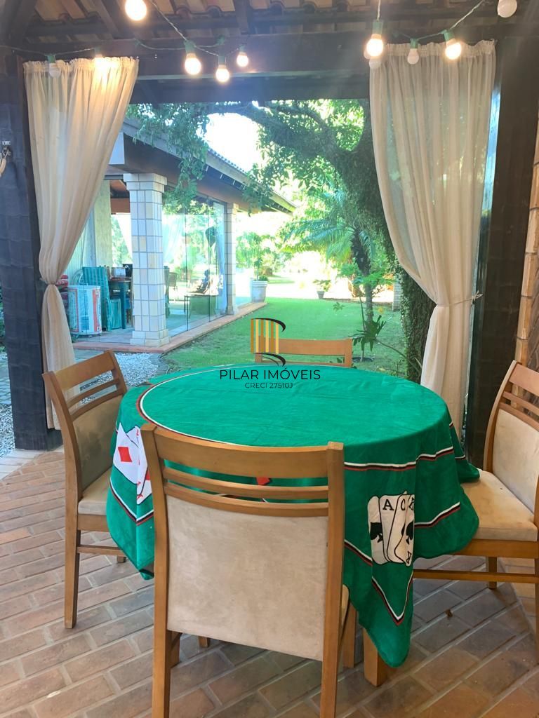 Casa na praia de Atlântida de 4 dormitórios