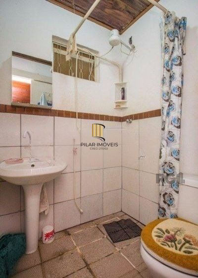 Casa sobrado no bairro Rio Branco de 4 dormitórios e vaga