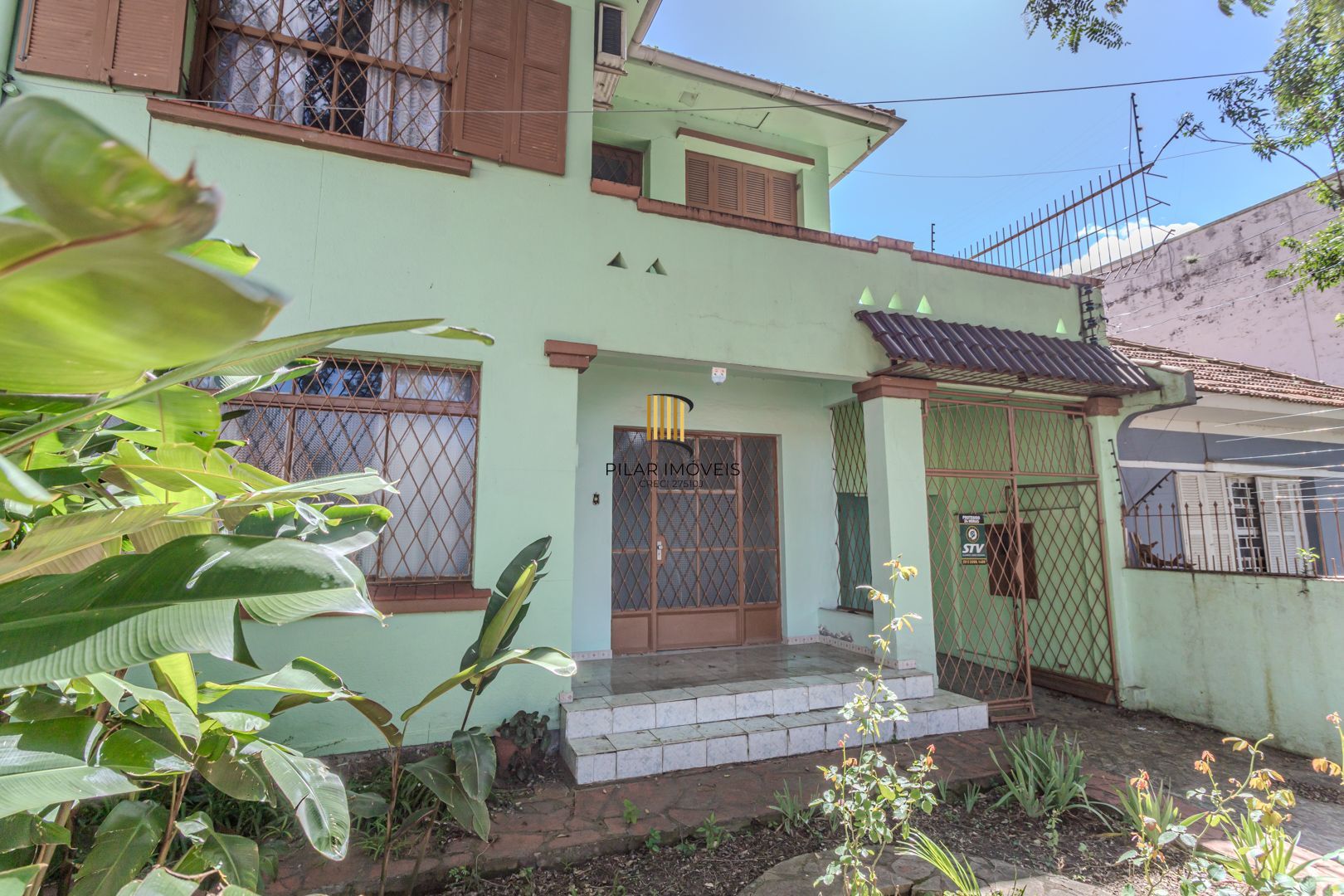 Casa sobrado no Partenon com 5 dormitórios e 4 vagas - Pilar Imóveis