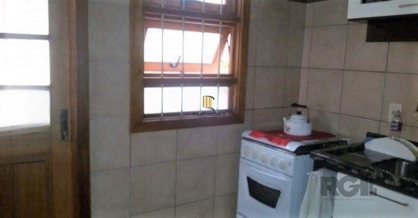 Casa em condomínio no Partenon de 3 dormitórios e vaga