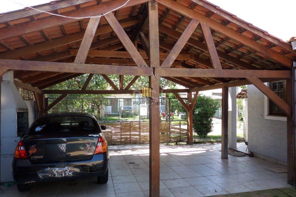 Casa na Hípica com 3 dormitórios e 2 vagas