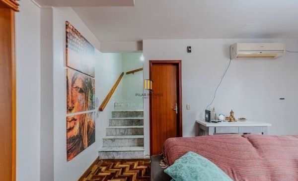 Casa em condomínio no bairro Santo Antômnio de 4 dormitórios e 2 vagas