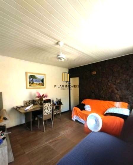 Casa no bairro Partenon de 3 dormitórios e vaga