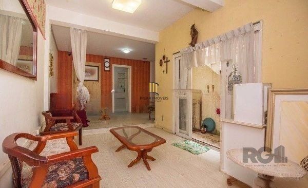 Casa sobrado no bairro Rio Branco de 4 dormitórios e vaga