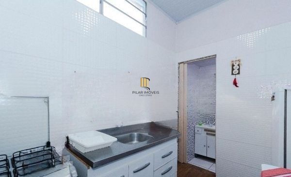 Casa no bairro Tristeza de 4 dormitórios e 4 vagas