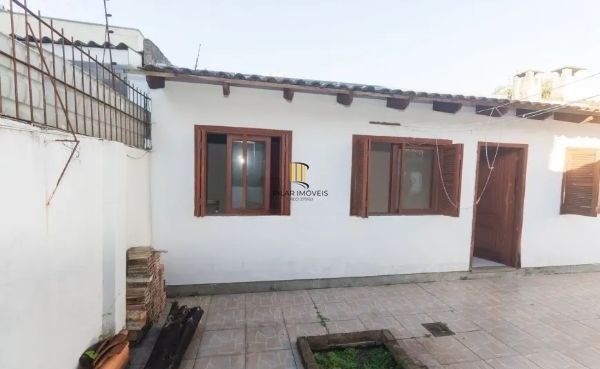 Casa no bairro Jardim Botânico de 4 dormitórios e 3 vagas