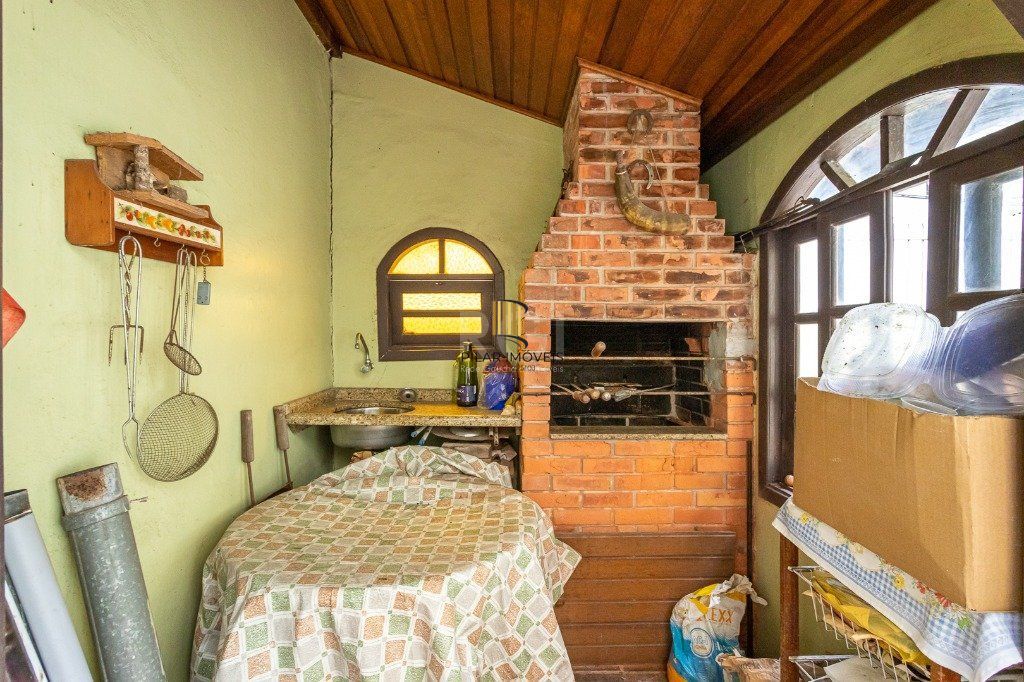 Casa sobrado no Jardim Botânico de 5 dormitórios e 2 vagas