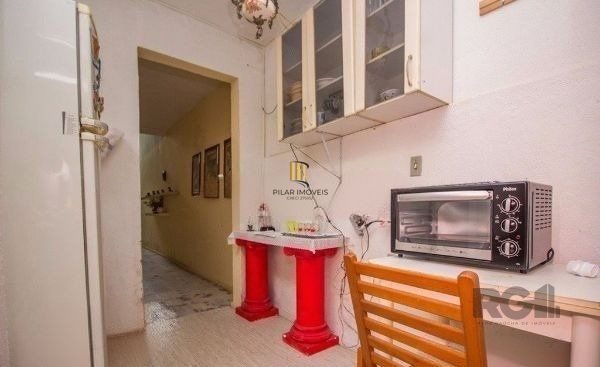 Casa sobrado no bairro Rio Branco de 4 dormitórios e vaga