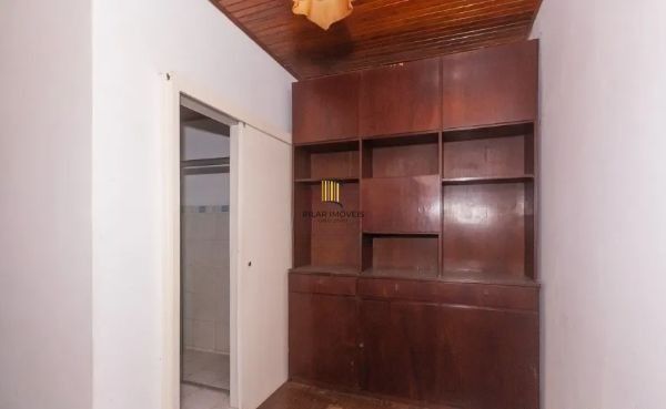 Casa no bairro Jardim Botânico de 4 dormitórios e 3 vagas