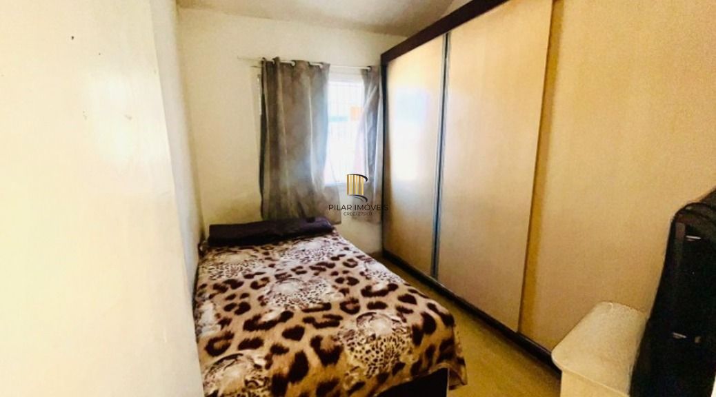 Casa em condomínio no bairro Sarandi de 2 dormitórios, vaga e infra