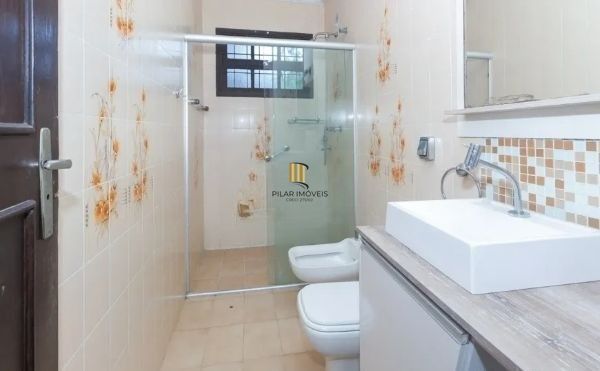 Casa no bairro Jardim Botânico de 4 dormitórios e 3 vagas