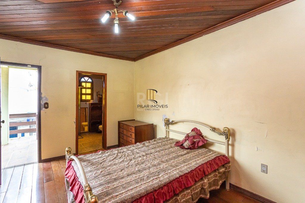 Casa sobrado no Jardim Botânico de 5 dormitórios e 2 vagas