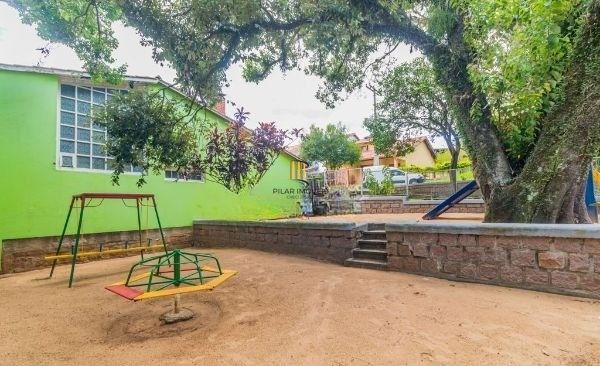 Casa em condomínio no bairro Santo Antômnio de 4 dormitórios e 2 vagas