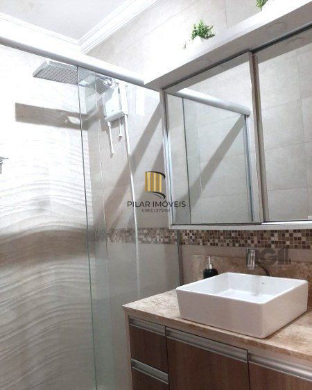 Sobrado triplex no Partenon de 3 dormitórios e 2 vagas