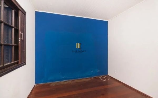 Casa no bairro Jardim Botânico de 4 dormitórios e 3 vagas