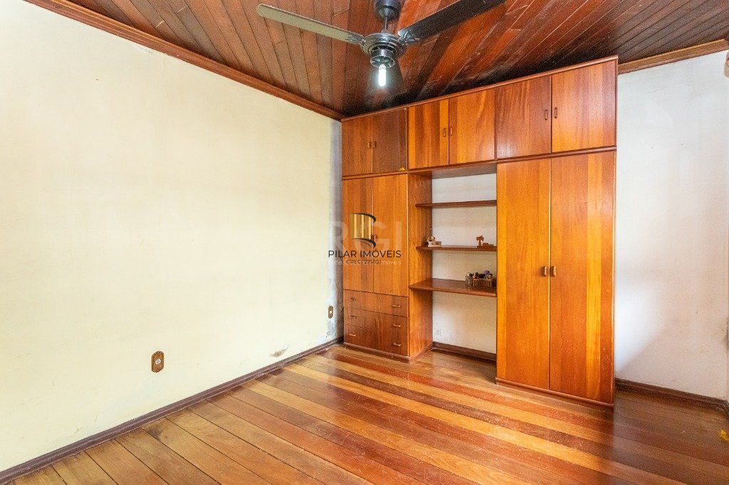 Casa sobrado no Jardim Botânico de 5 dormitórios e 2 vagas