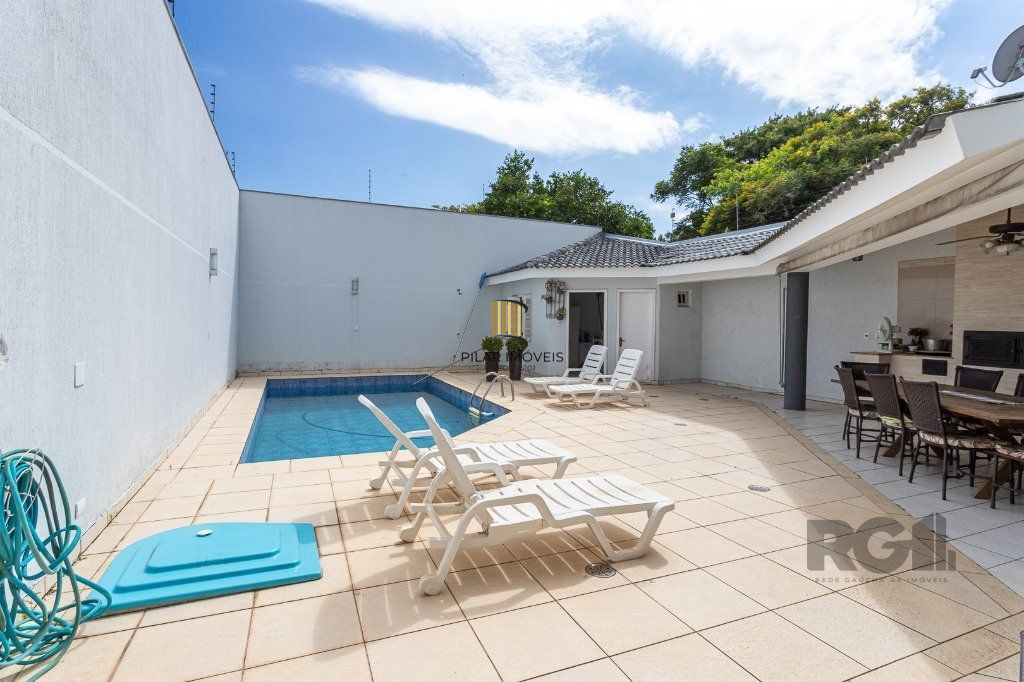 casa sobrado no Alto Petrópolis de 5 dormitórios e 3 vagas