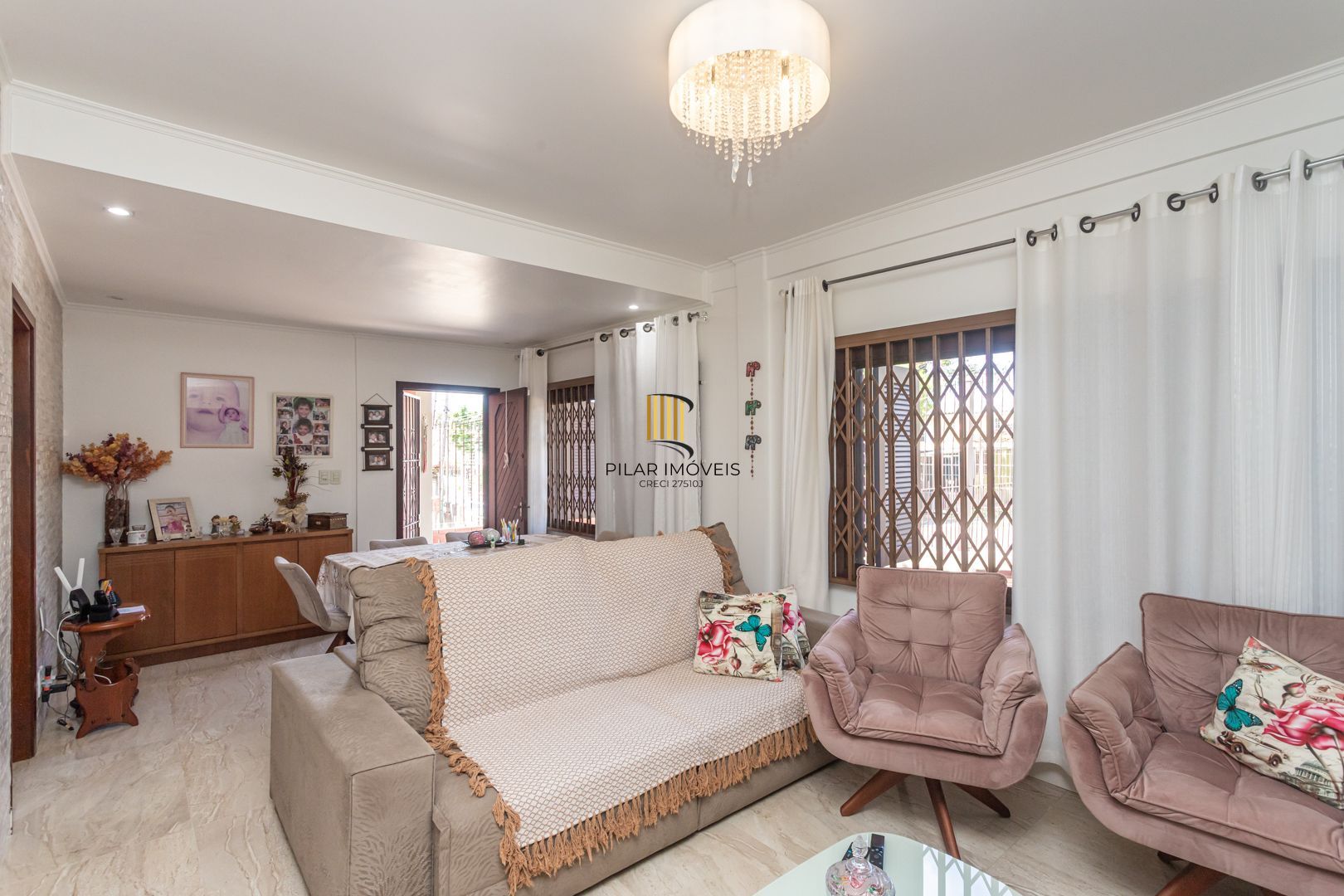 Casa 3 dormitórios no bairro Camaquã