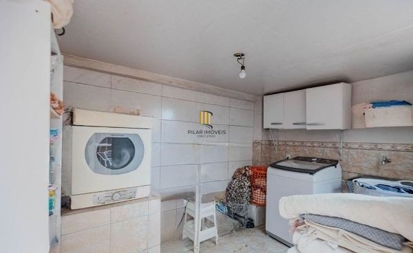 Casa em condomínio no bairro Santo Antômnio de 4 dormitórios e 2 vagas