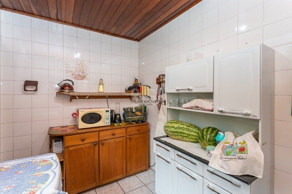 Casa sobrado no Jardim Botânico de 5 dormitórios e 2 vagas