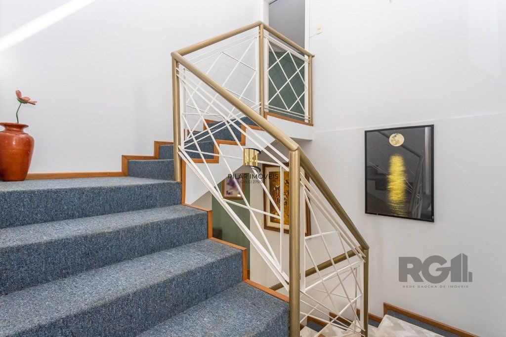 casa sobrado no Alto Petrópolis de 5 dormitórios e 3 vagas