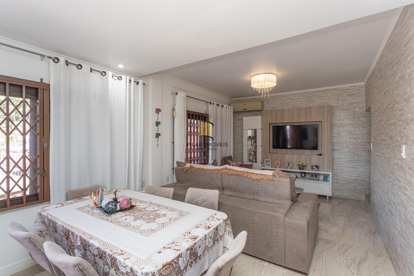 Casa 3 dormitórios no bairro Camaquã