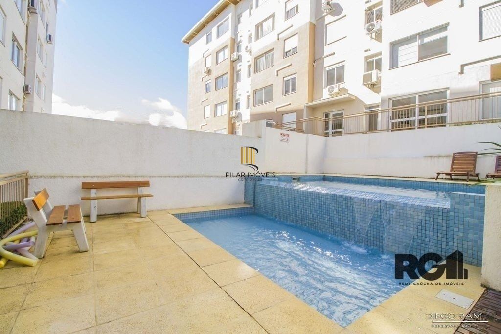 Apartamento no Urbano Menino Deus de 1 dormitório vaga e pátio