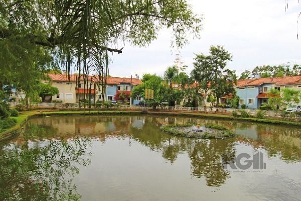 Casa sobrado em condomínio fechado na Vila Nova de 3 dormitórios e 2 vagas