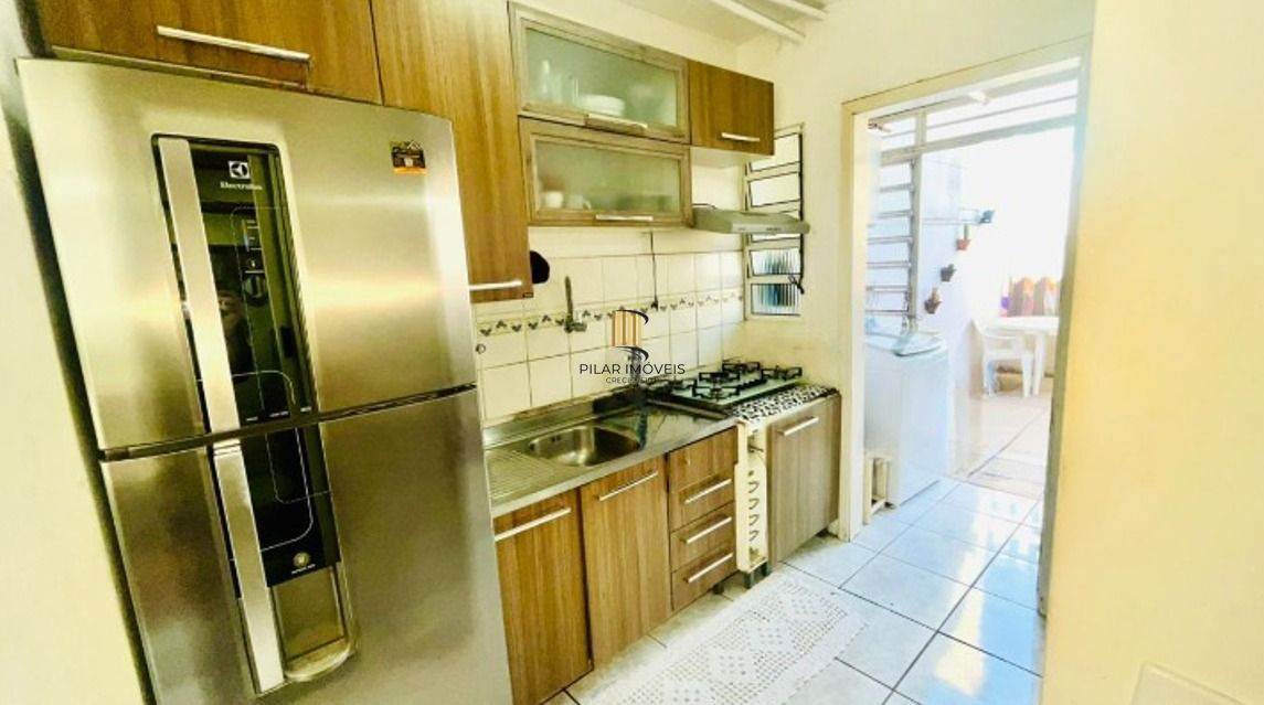 Casa em condomínio no bairro Sarandi de 2 dormitórios, vaga e infra