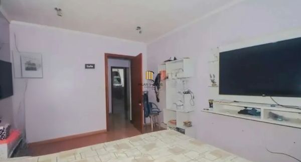 Casa sobrado no bairro Vila Ipiranga de 4 dormitórios e 2 vagas