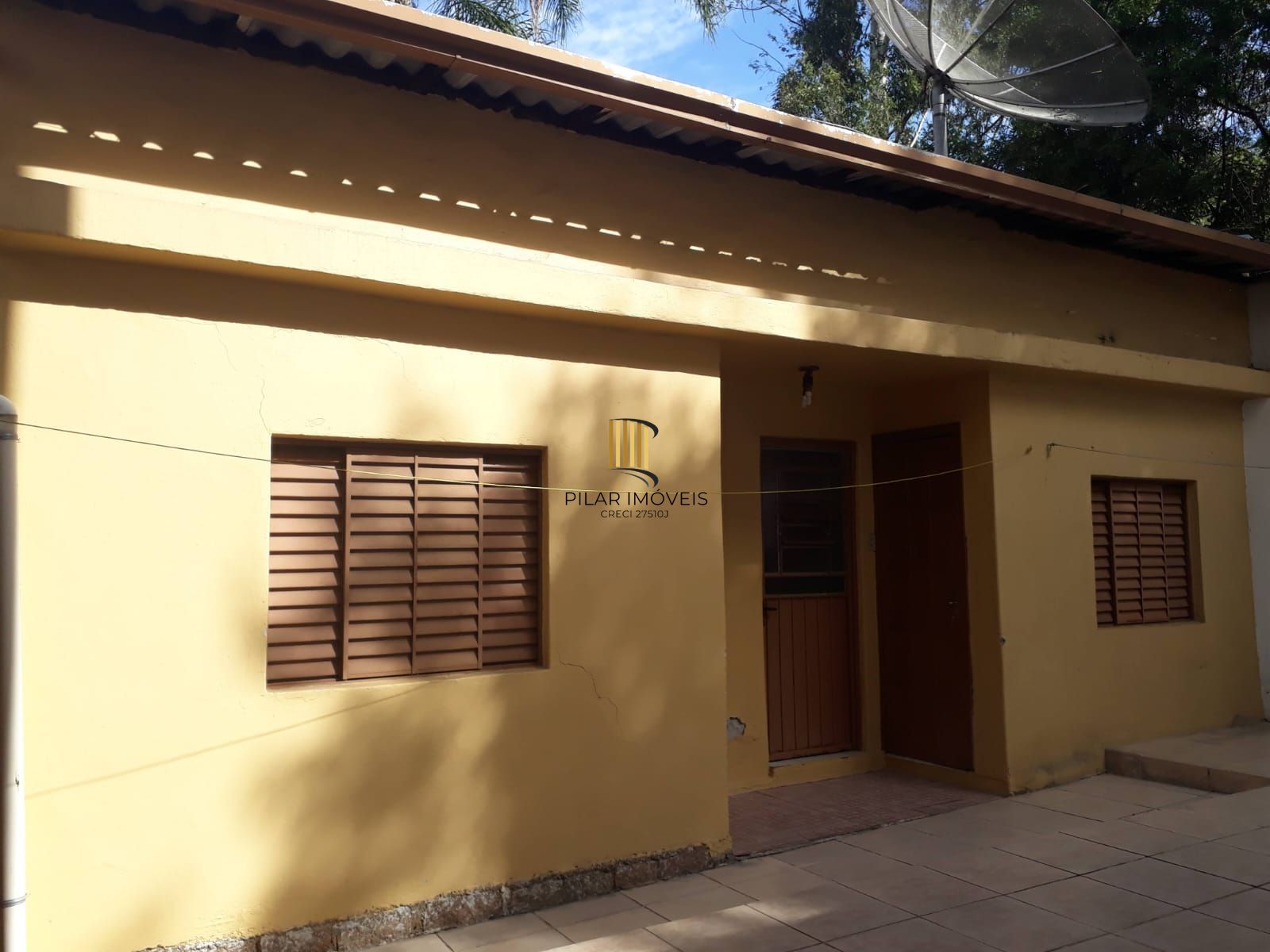 Casa sobrado no bairro Auxiliadora de 3 dormitórios e 3 vagas