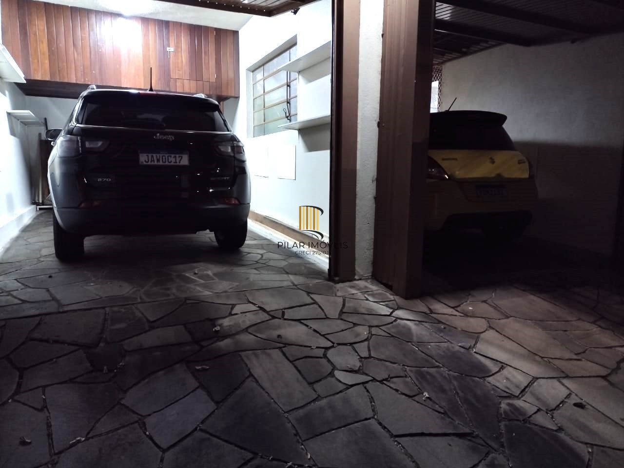 Casa 4 dormitórios no bairro Partenon