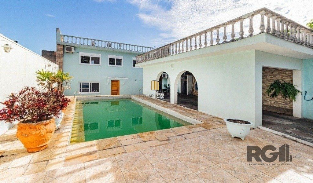 Casa 4 dormitórios no bairro Chácara das Pedras - Pilar Imóveis