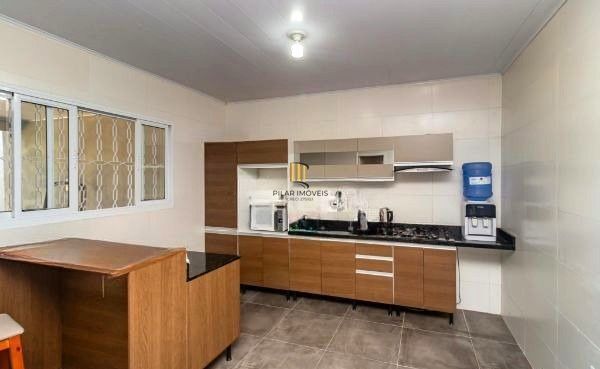 Casa no bairro Jardim Carvalho de 2 dormitórios e amplo pátio