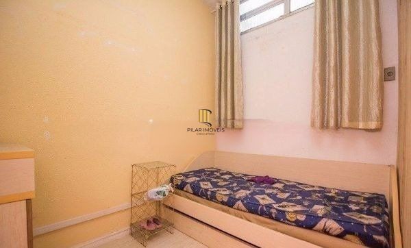 Casa sobrado no bairro Rio Branco de 4 dormitórios e vaga