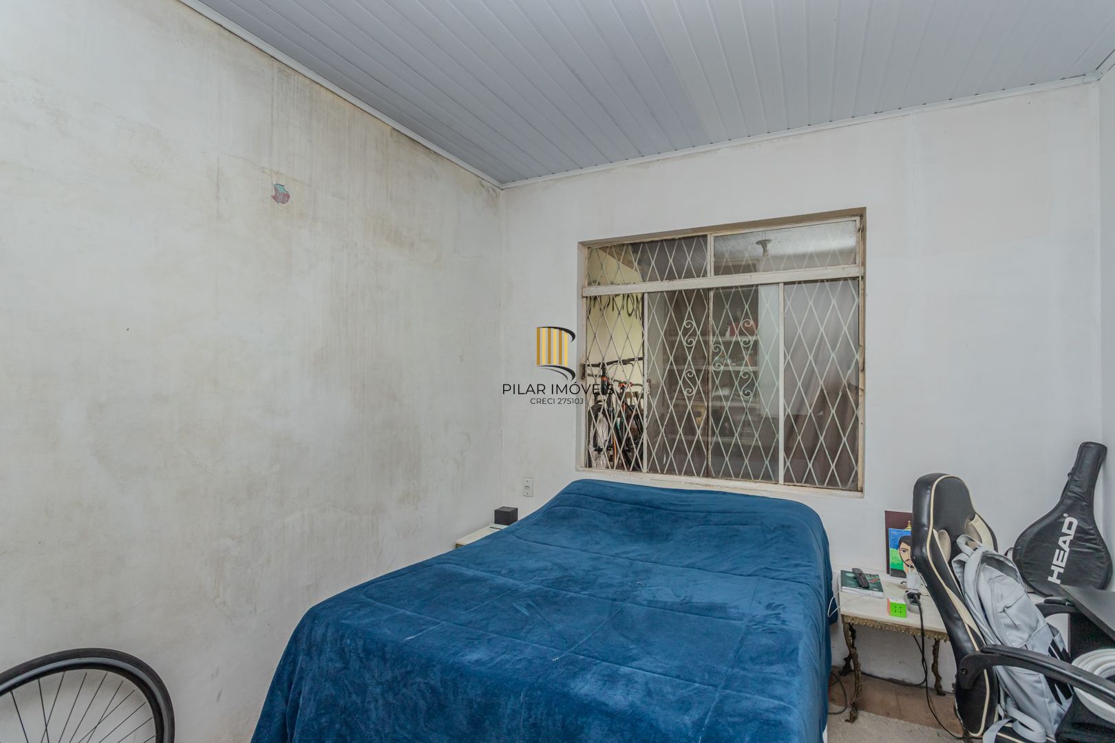 Casa no bairro Jardim Botânico de 3 dormitórios e garagem e terreno com 370m²