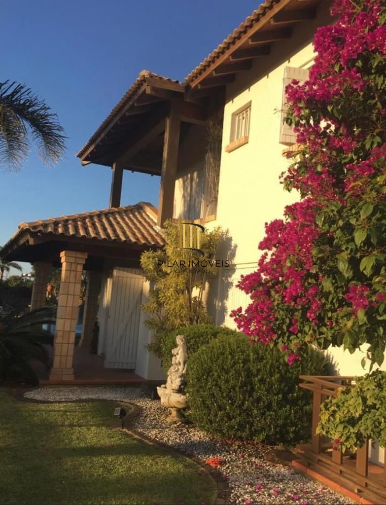 Casa na praia de Atlântida de 4 dormitórios