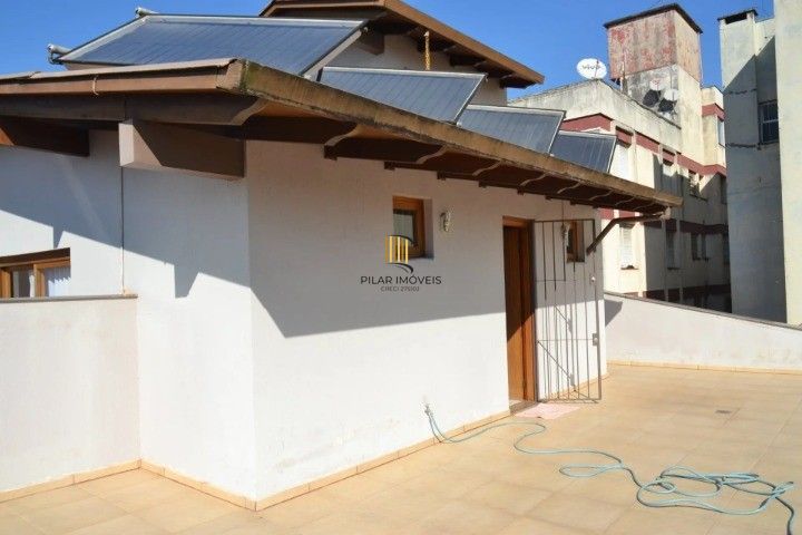 Casa Comercial e Residencial com 518m² (4 quartos / 5 banheiros / 3 vagas garagem) no Bairro Partenon localizada à meia quadra da Av. Bento Gonçalves.