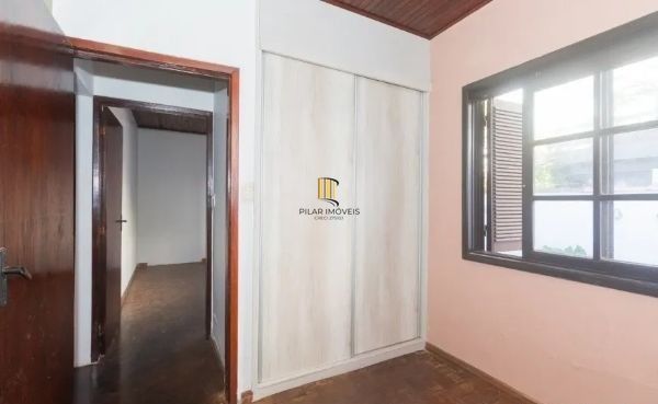 Casa no bairro Jardim Botânico de 4 dormitórios e 3 vagas