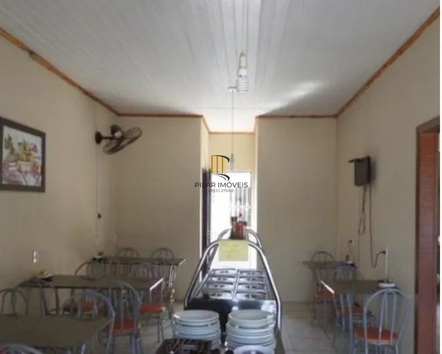 Casa 3 dormitórios no bairro Piratini