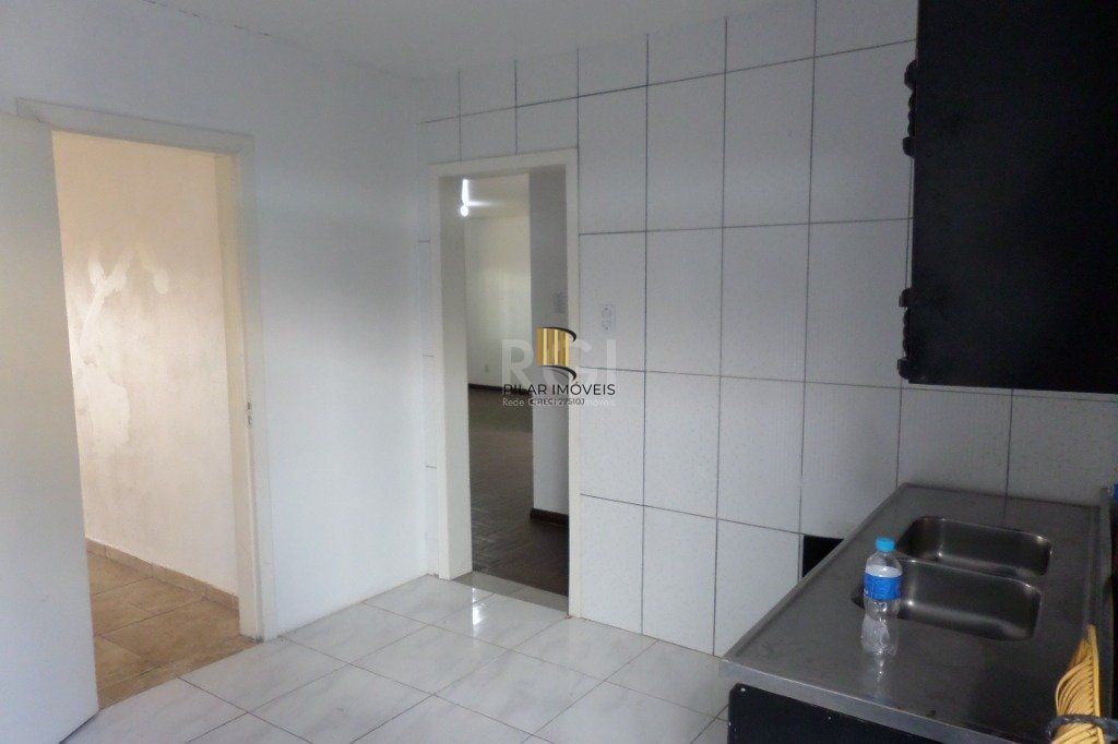 Casa no bairro Jardim Botânico de 3 dormitórios e 2 vagas