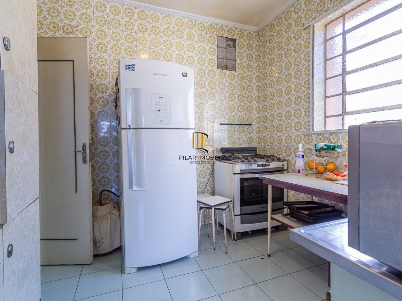 Sobrado 4 dormitórios no bairro Farroupilha