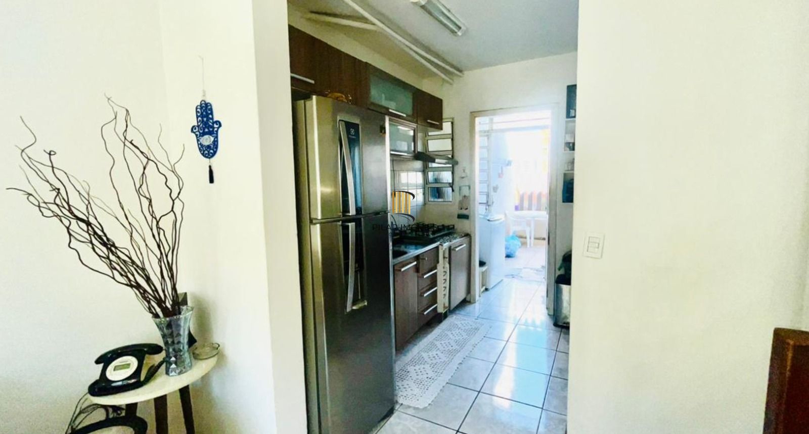 Casa em condomínio no bairro Sarandi de 2 dormitórios, vaga e infra